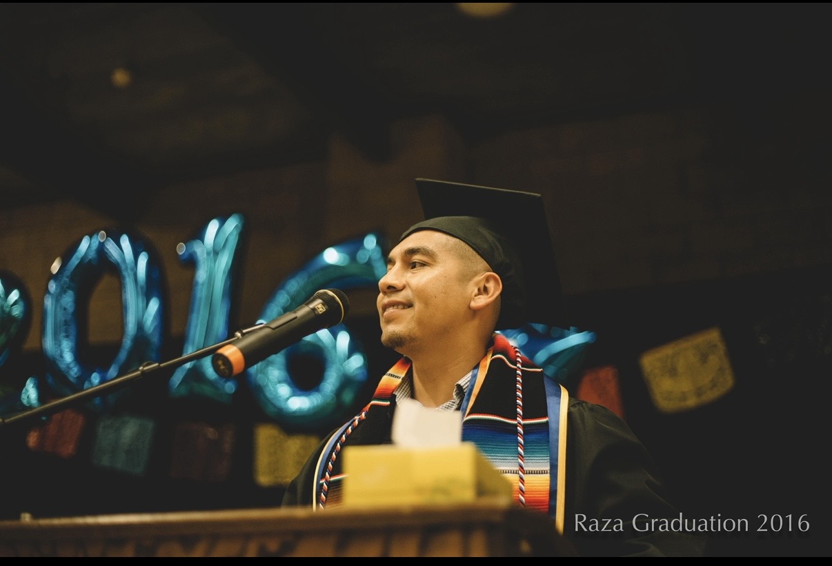 Armando speaking at graduation
